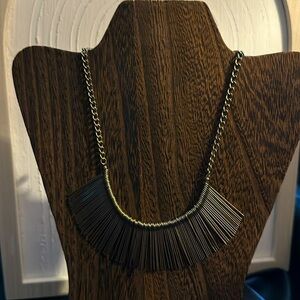 Radiant spike necklace.  Spikes are 1-1/2 inches long.  Necklace is 18 inches.